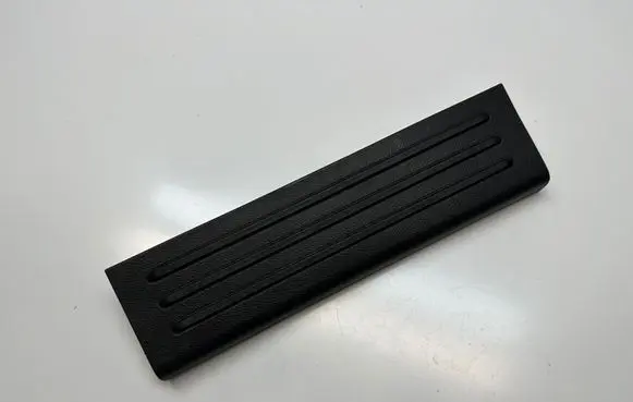 Rear sill trim cover