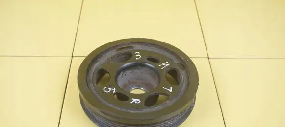 Opel Astra K Timing belt tensioner pulley F12SHL