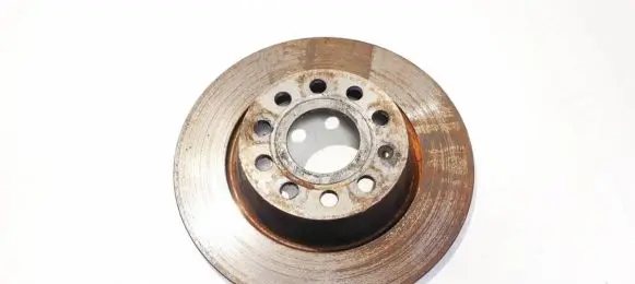 Volkswagen PASSAT B6 Rear brake disc neventiliuojamas