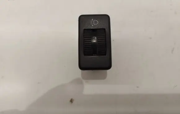 Headlight level height control switch