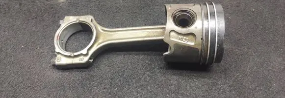 Opel Corsa E Piston with connecting rod 06935