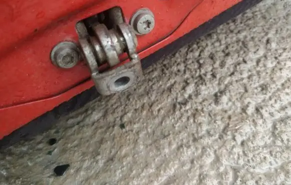 Rear door check strap stopper
