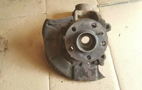 Front wheel hub spindle knuckle