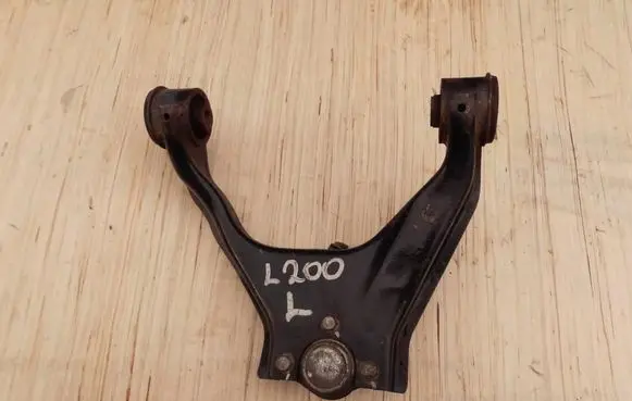 Mitsubishi L200 Front lower control arm/wishbone 65566556