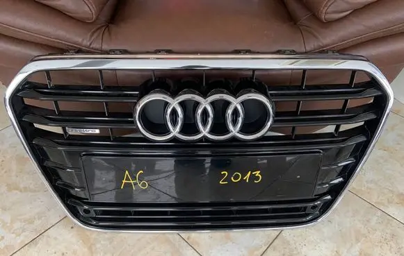 Front bumper upper radiator grill