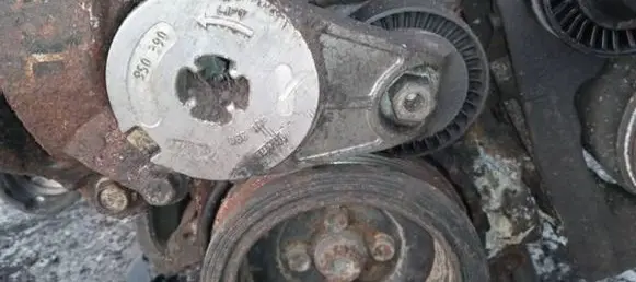 Generator/alternator belt tensioner