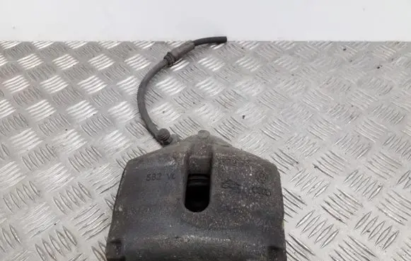 Volkswagen Golf Plus Front brake caliper 582