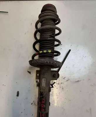 Skoda Fabia Mk2 (5J) Front shock absorber with coil spring 