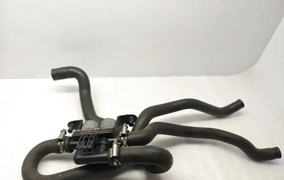 Coolant heater control valve