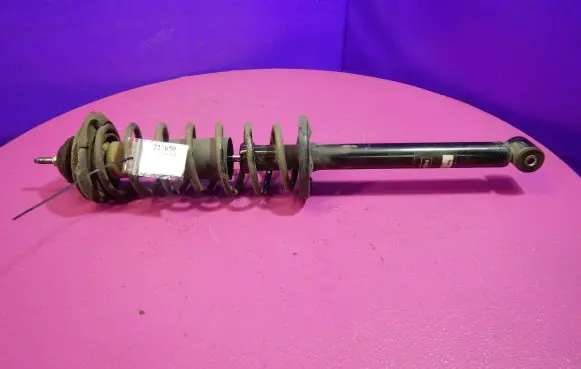 Volkswagen Golf II Front shock absorber with coil spring TLA000112
