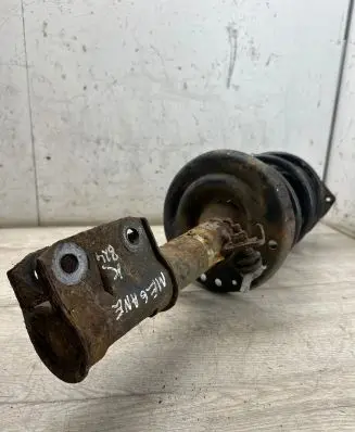 Renault Megane III Front shock absorber with coil spring