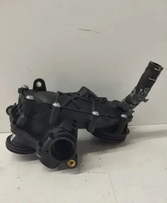 Thermostat/thermostat housing