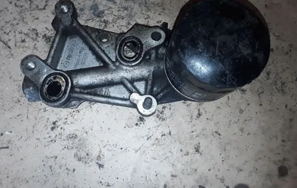 Mazda 6 Oil filter mounting bracket R2AA14311