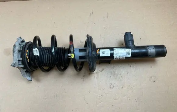 Volkswagen ID.7 Front shock absorber with coil spring 11A400035 1EA412331D