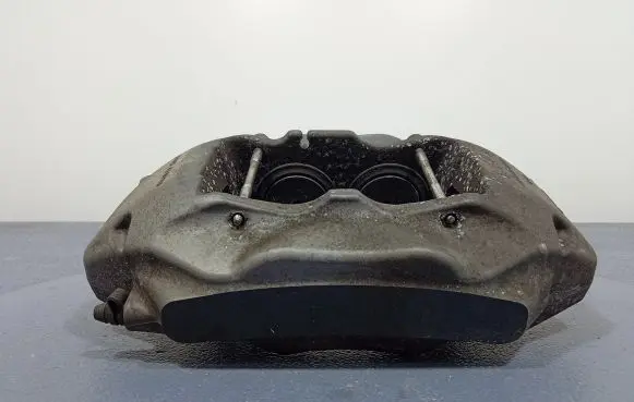 Volkswagen Touareg II Front brake caliper 7P6615106AE