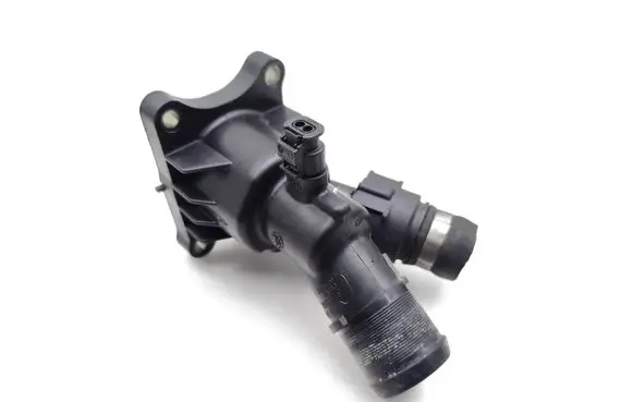 Thermostat/thermostat housing
