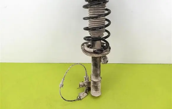 Opel Astra H Front shock absorber with coil spring