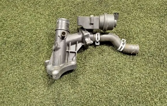 Thermostat/thermostat housing