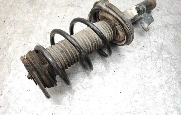 Front shock absorber with coil spring