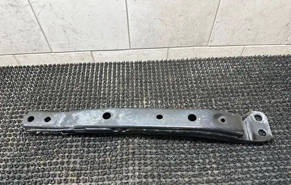 Radiator support slam panel bracket
