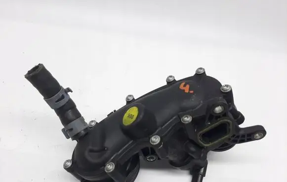 Thermostat/thermostat housing