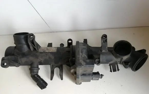 Volkswagen Touran I Throttle valve 03C128063A 03C129617E 03C145861D