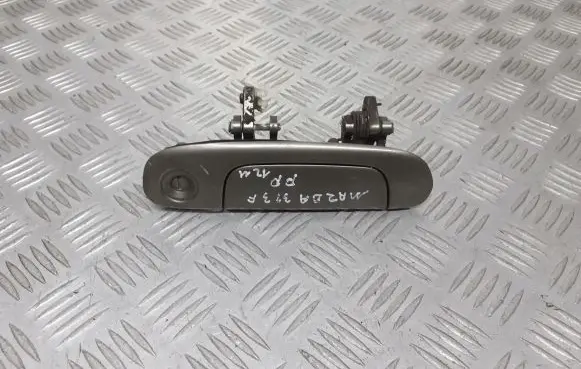 Mazda 323 F Front door exterior handle/bracket 