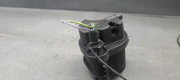 Ford Escort Fuel filter housing 2S6Q-9155-AD