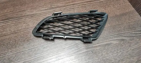 Mazda 626 Front fog light trim/grill GJ6G50C21