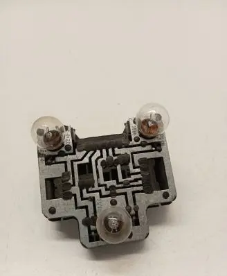 Tail light bulb cover holder