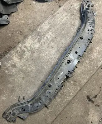 Top upper radiator support slam panel