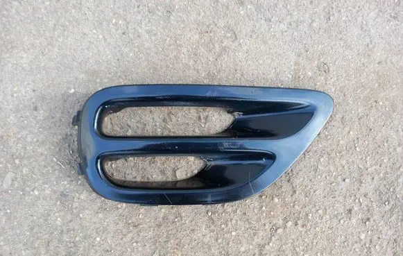 Subaru Legacy Front bumper lower grill 57731AG020