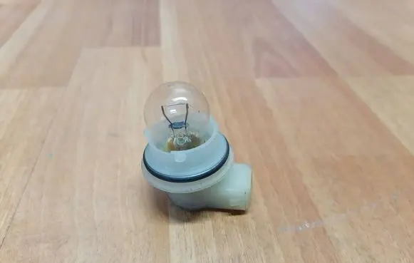 Saab 9-5 Tail light bulb cover holder 