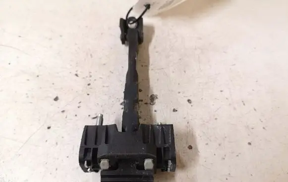 Volvo V50 Front door check strap stopper
