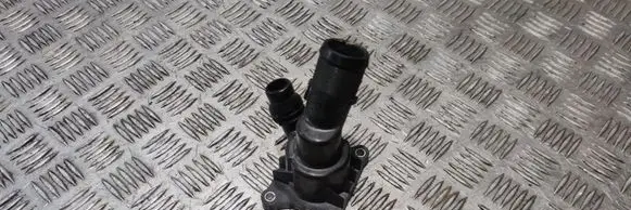 Thermostat/thermostat housing