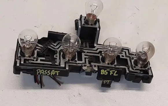Tail light bulb cover holder