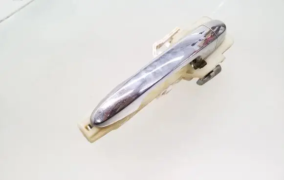 KIA Carens II Front door exterior handle 7A10