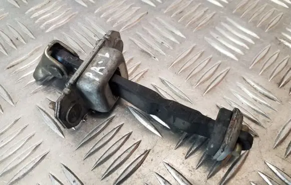 Subaru Legacy Front door check strap stopper