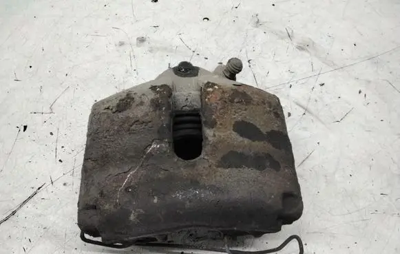 Volkswagen Golf V Front brake caliper