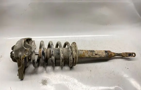 Front shock absorber with coil spring