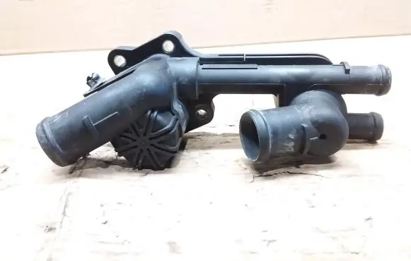 Thermostat/thermostat housing