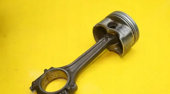 Piston with connecting rod