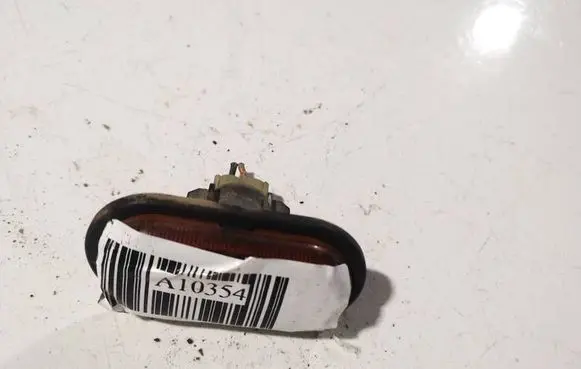 Opel Vivaro Front fender indicator light 7700847333