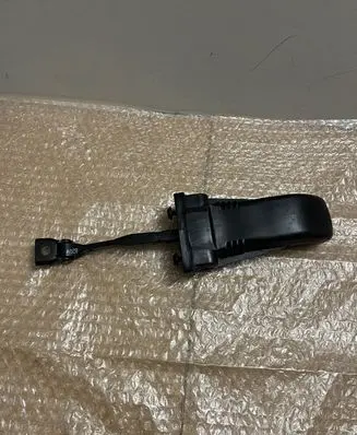 Front door check strap stopper