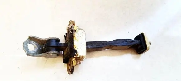 Nissan Almera Rear door check strap stopper