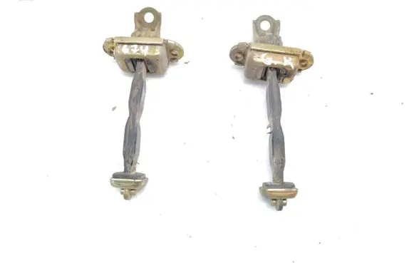 Nissan Almera Tino Rear door check strap stopper