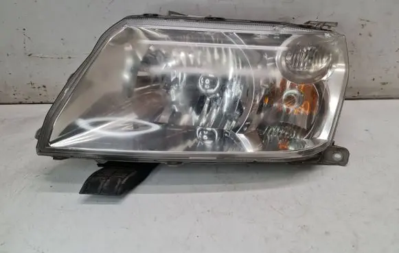 Suzuki Grand Vitara II Headlight/headlamp 10059076