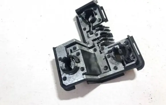 Tail light bulb cover holder