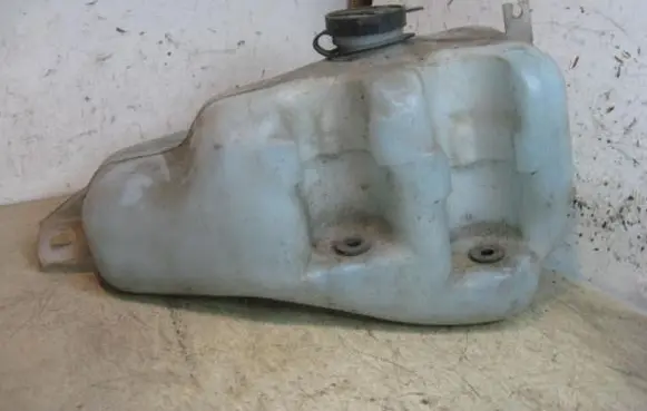 Renault Clio I Windshield washer fluid reservoir/tank 7700793031