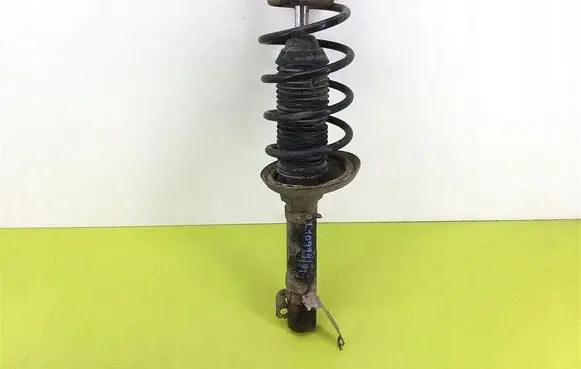 Skoda Octavia Mk1 (1U) Front shock absorber with coil spring 1J0413031S